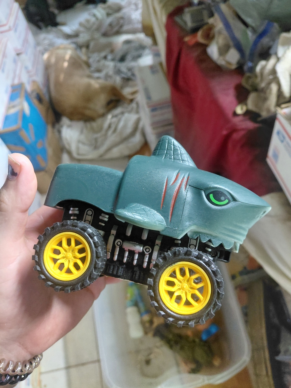 Wild Zoomies Shark monster truck by Deluxebase, featuring a dark green shark bod